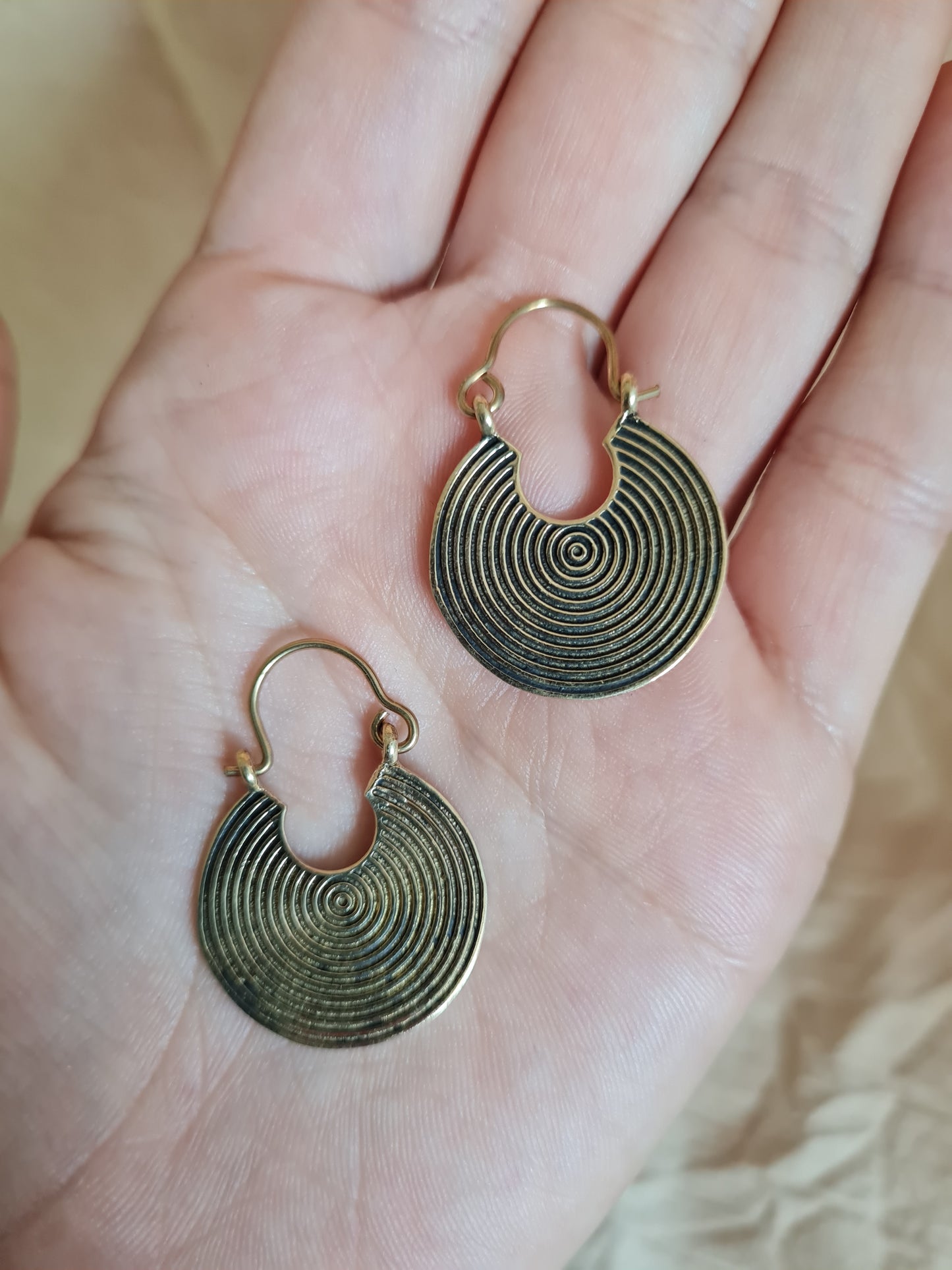 Circle of light earrings